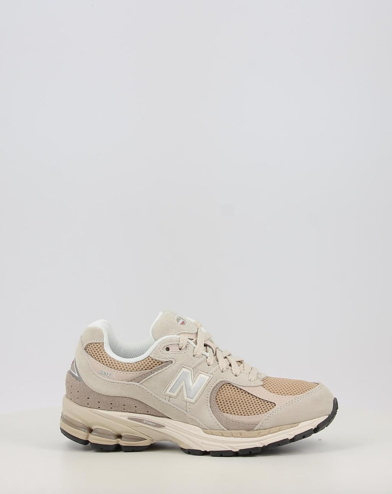 Baskets NEW BALANCE U2002RB beige