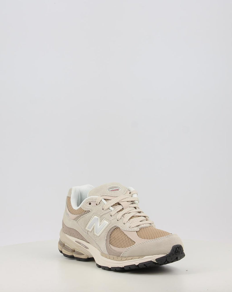 Baskets NEW BALANCE U2002RB beige