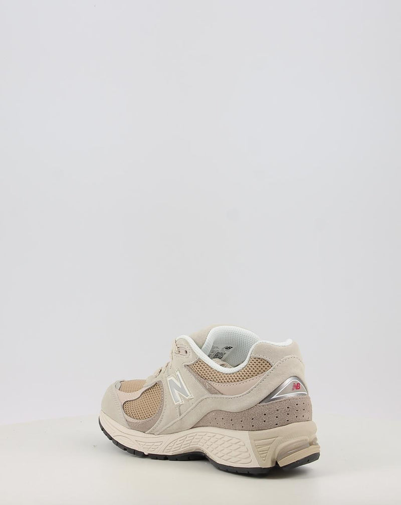 Baskets NEW BALANCE U2002RB beige